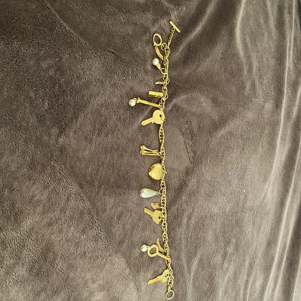Vintage 1980s Rare Moschino Redwall 15 iconic brand gold charm necklace